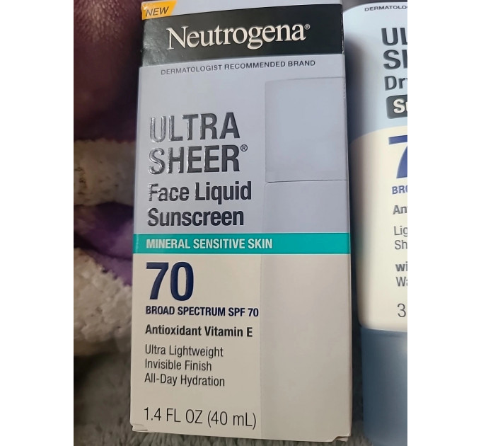 Набір сонцезахисних засобів Neutrogena Ultra Sheer SPF 70 (лосьйон для тіла 88 мл і флюїд для обличчя 40 мл)