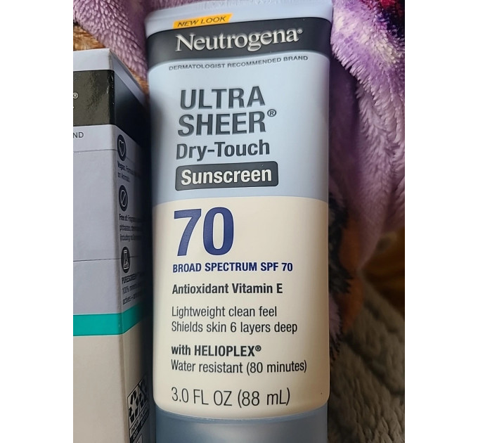 Набір сонцезахисних засобів Neutrogena Ultra Sheer SPF 70 (лосьйон для тіла 88 мл і флюїд для обличчя 40 мл)