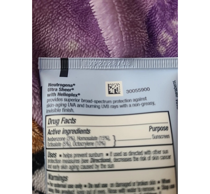 Набір сонцезахисних засобів Neutrogena Ultra Sheer SPF 70 (лосьйон для тіла 88 мл і флюїд для обличчя 40 мл)