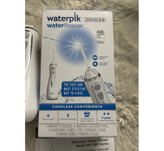 Два портативних іригатори Waterpik WP-583 Cordless Advanced 2 шт (синій і білий)