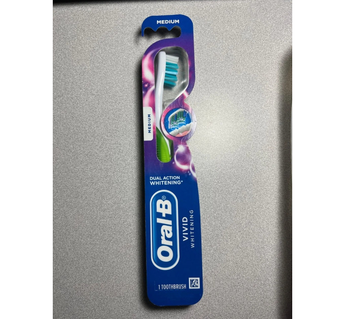 Отбеливающая зубная щётка Oral-B Vivid Whitening цвет лайм
